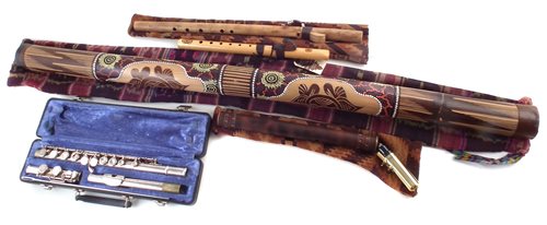 Lot 116 - Armstrong flute, two American Indian flutes, Bamboo Sax and a Didgeridoo
