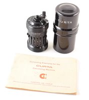 Lot 154 - Curta Type 1 (No. 8241) calculating machine complete with booklet.