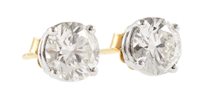 Lot 54 - Pair of diamond solitaire 18ct gold stud earrings