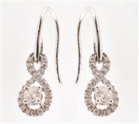 Lot 53 - Pair of diamond 18ct white gold drop earrings