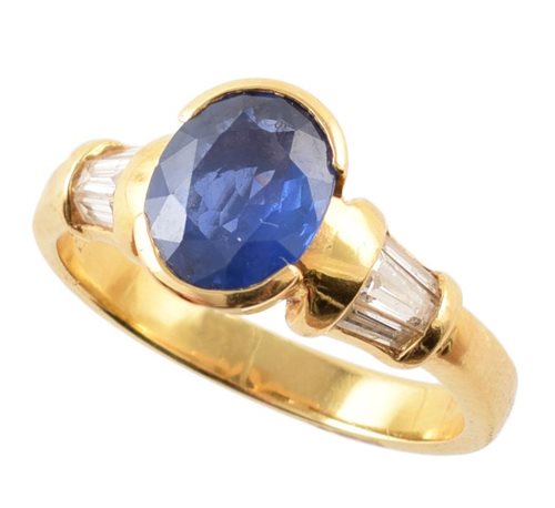 Lot 102 - Sapphire single stone 18ct yellow gold ring with diamond set shoulders