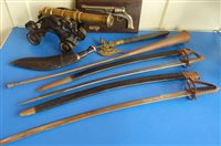 Lot 273 - Ornamental cast iron and brass cannon, two swords and ornamental knives and coaching horn.