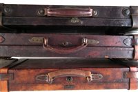 Lot 167 - Leather double gun case William Powell and Son, single Westley Richards case and Leather on oak case.